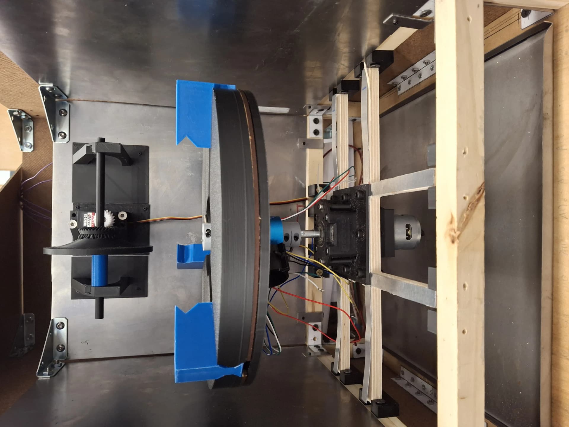 Close-up photo of the disc cleaner mechanical assembly during build or testing