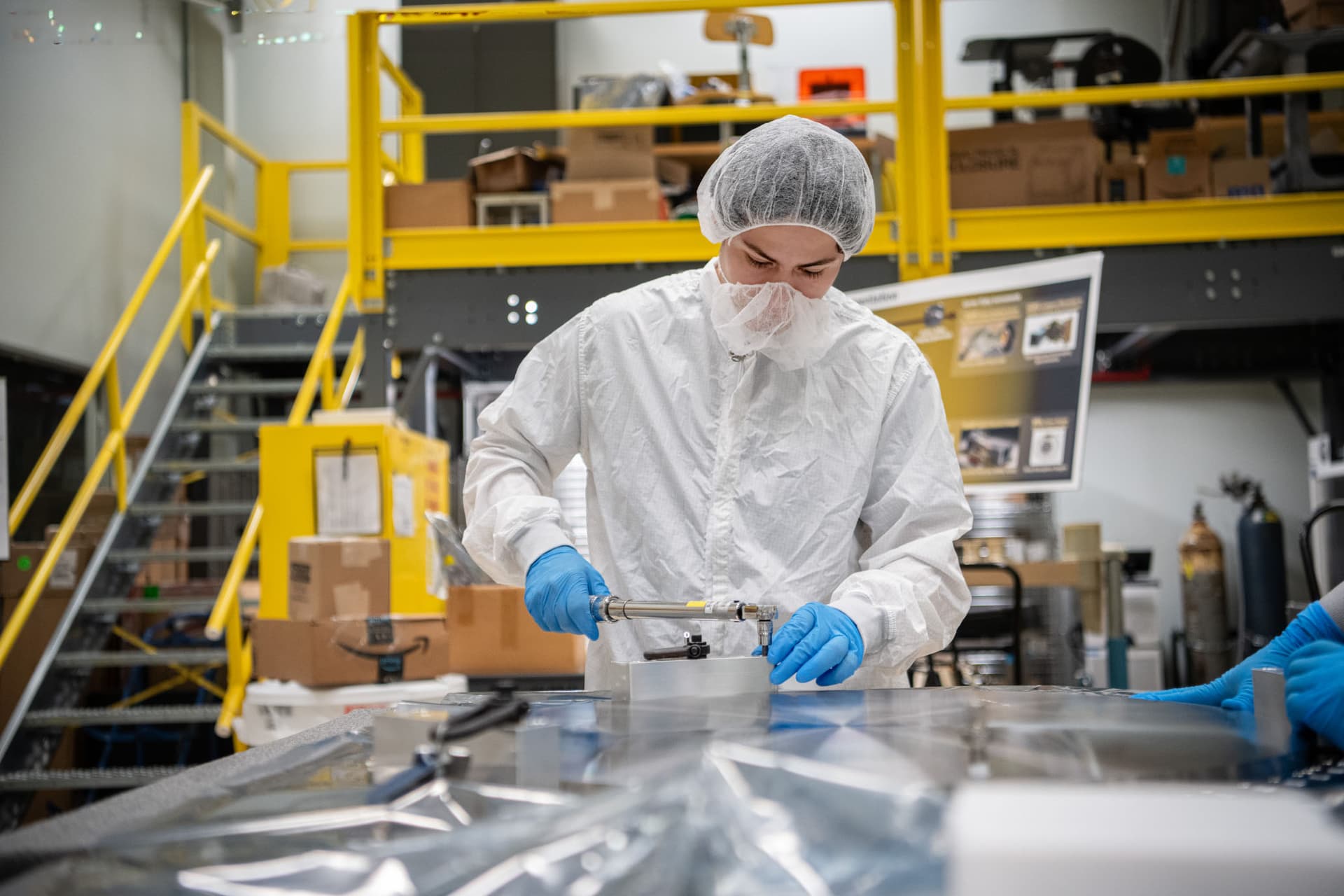 Working at a lab bench at NASA Goddard Space Flight Center